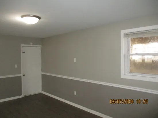 an empty room with a window