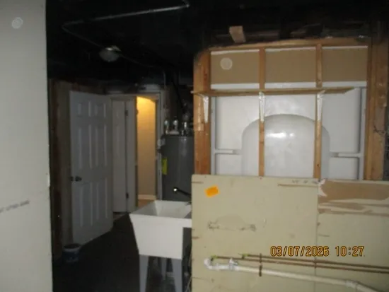 a view of a hallway with front door