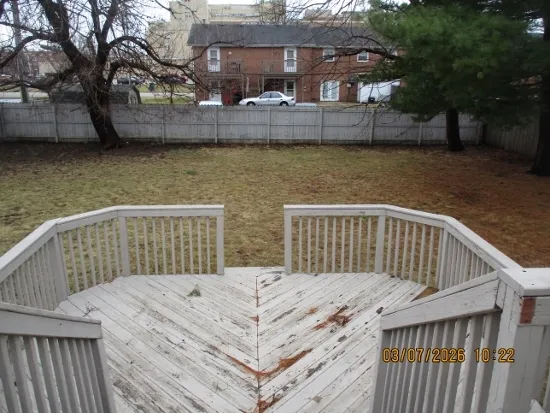 a balcony view with a lake view
