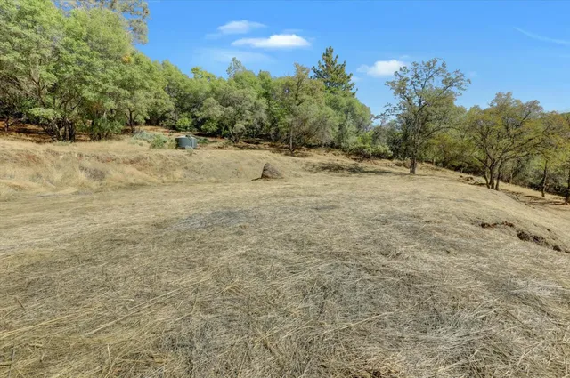 a view of a yard covered with snow
