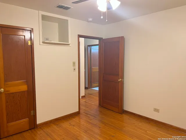 a view of small space with racks on the wall