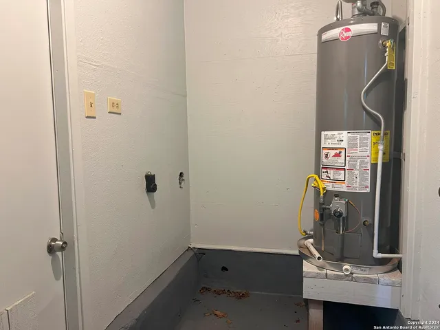 a front view of a house with a garden and yard