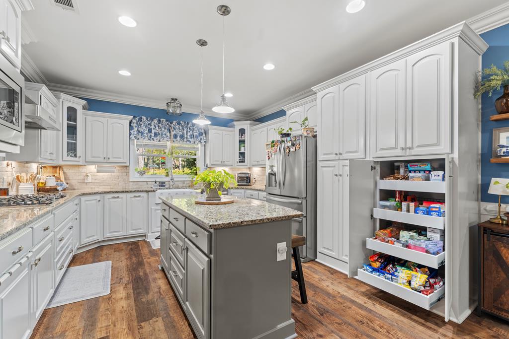 2800 Hopewell Church Road Pine Mountain, GA 31822 - Photo 20 of 39 a kitchen with stainless steel appliances granite countertop a refrigerator a stove and a wooden floors