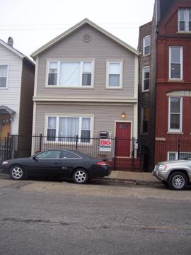 944 North Noble Street Chicago, IL 60642 - Photo 1 of 1 a car parked in front of a building