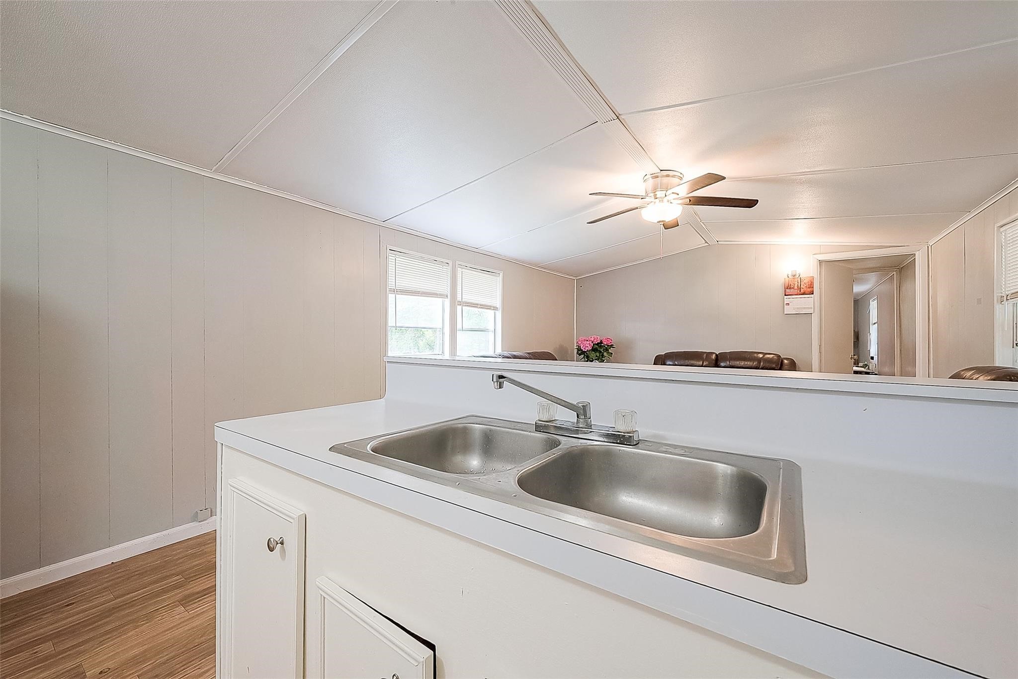 17536 White Oak Orchard Conroe, TX 77306 - Photo 14 of 24 a kitchen with a sink and a refrigerator