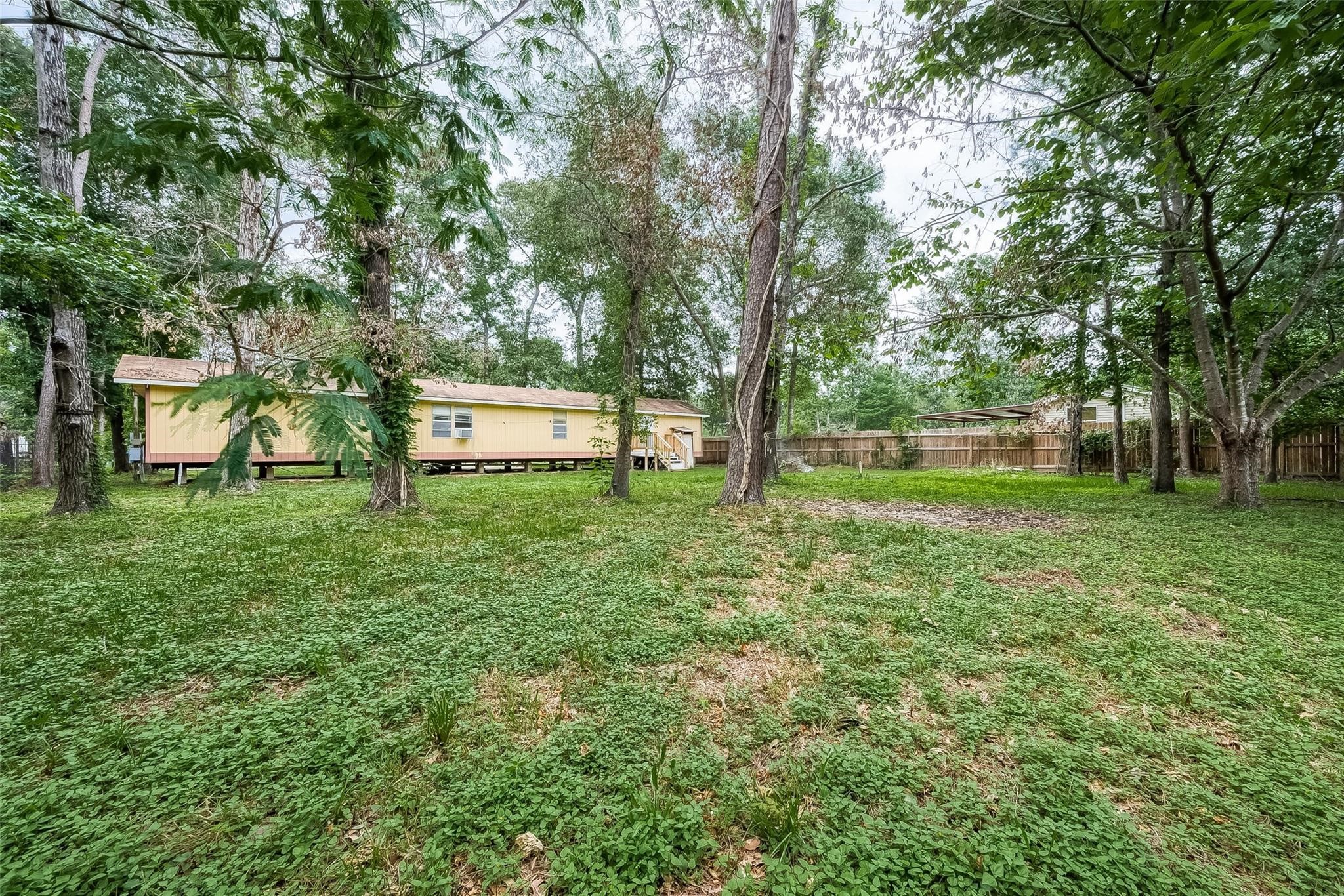17536 White Oak Orchard Conroe, TX 77306 - Photo 23 of 24 a view of a park with large trees