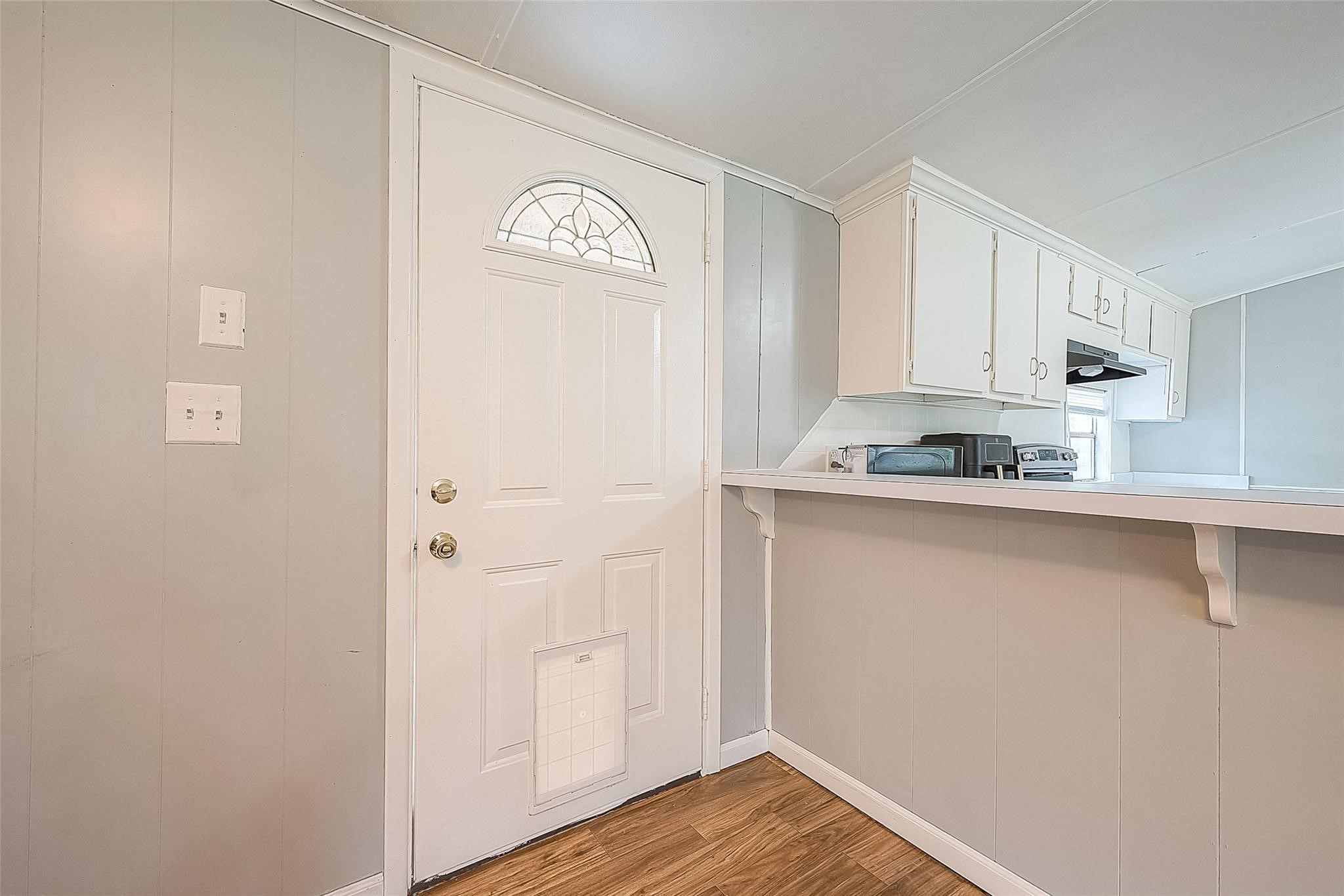 17536 White Oak Orchard Conroe, TX 77306 - Photo 5 of 24 a view of kitchen with wooden floor