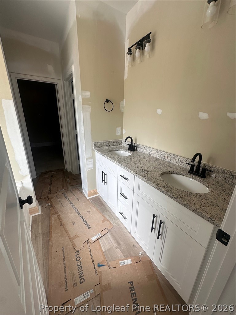 121 Merle Road Pinebluff, NC 28373 - Photo 6 of 28 a bathroom with a sink and mirror
