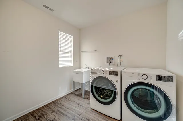 a utility room with dryer and washer