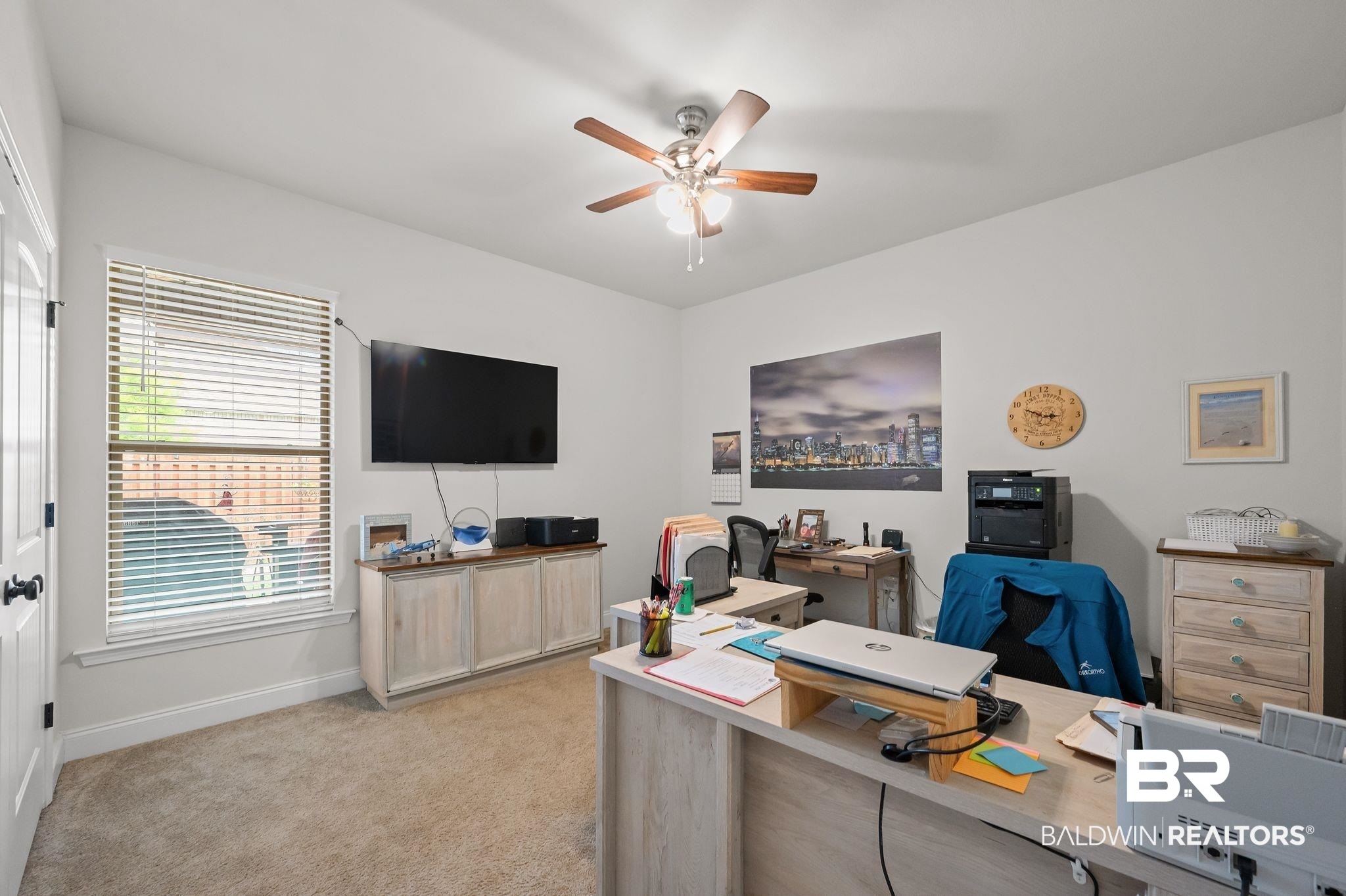 1165 Stella Road Foley, AL 36535 - Photo 26 of 42 Office area with ceiling fan, light colored carpet, and baseboards