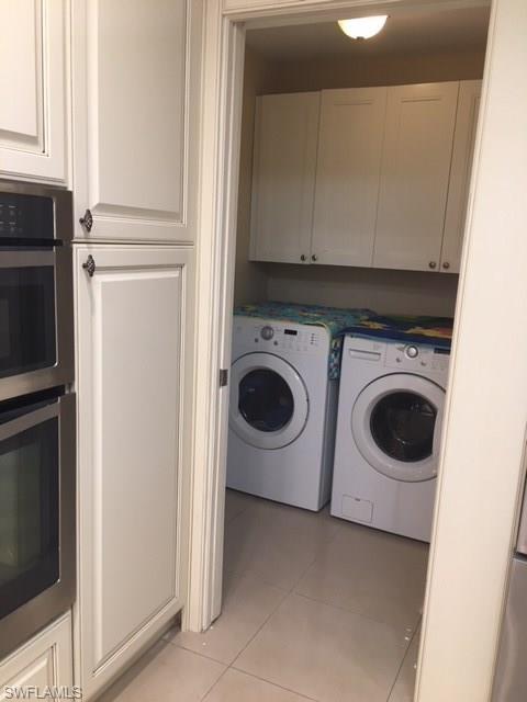 3906 14th Street Southwest Lehigh Acres, FL 33976 - Photo 19 of 25 a utility room with dryer and washer