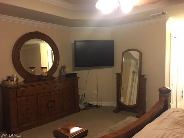 3906 14th Street Southwest Lehigh Acres, FL 33976 - Photo 23 of 25 a view of a livingroom with furniture and a mirror