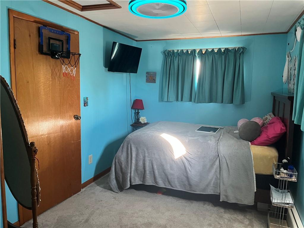 902 Chestnut Avenue Northern Cambria, PA 15714 - Photo 5 of 10 a bedroom with a bed and flat screen tv