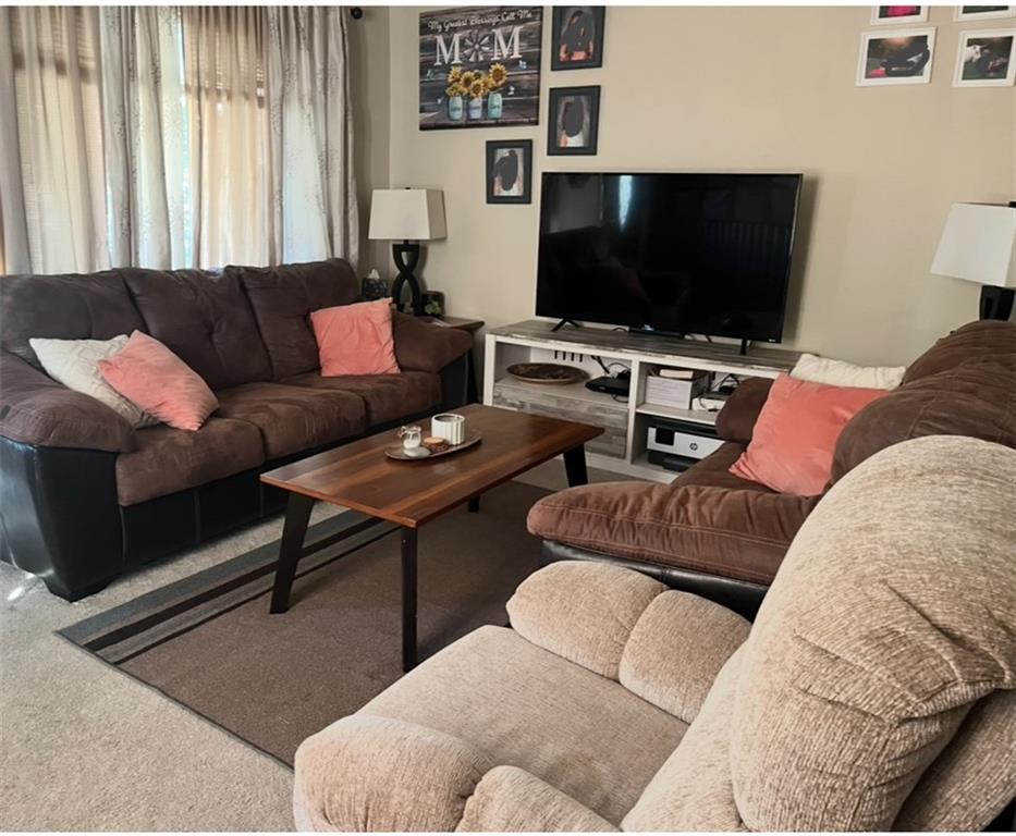 902 Chestnut Avenue Northern Cambria, PA 15714 - Photo 8 of 10 a living room with furniture and a flat screen tv