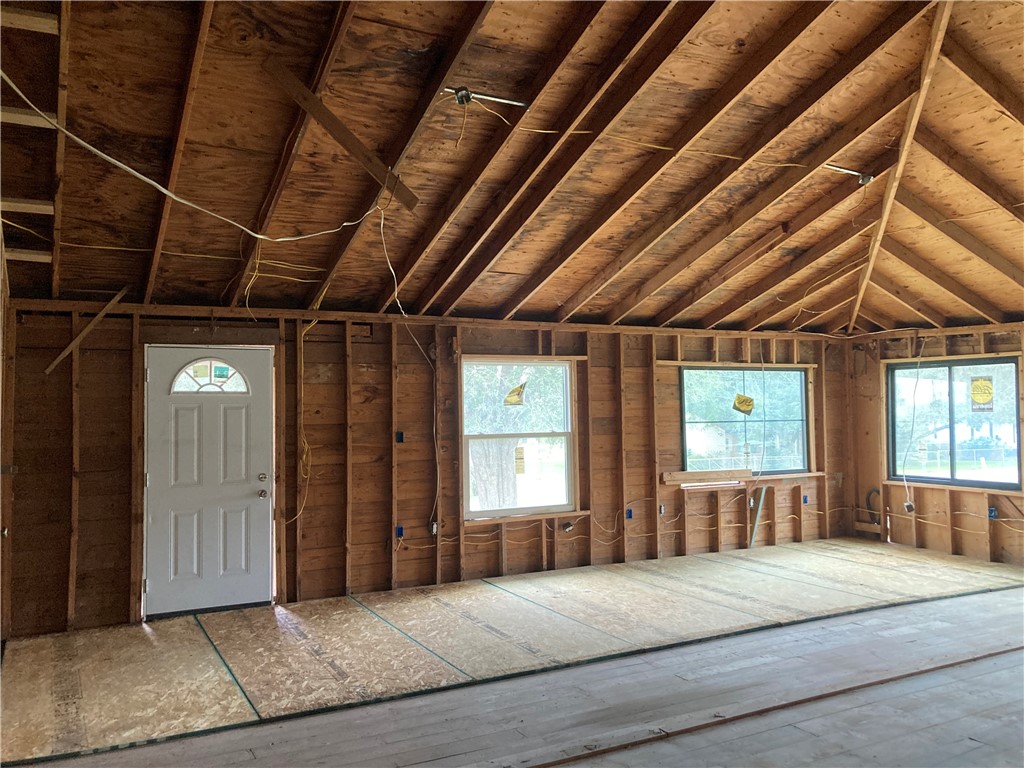 127 Lake Street Mathis, TX 78368 - Photo 14 of 33 a bedroom with furniture and a window