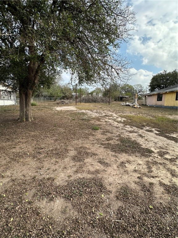127 Lake Street Mathis, TX 78368 - Photo 32 of 33 a view of a yard with an trees