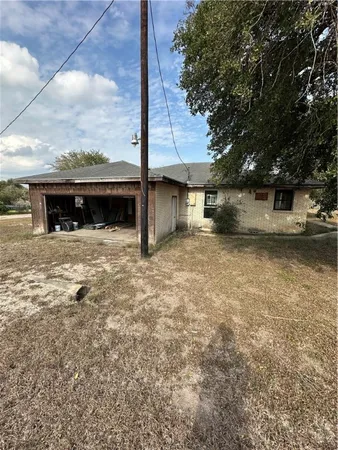 a house with trees in front of it