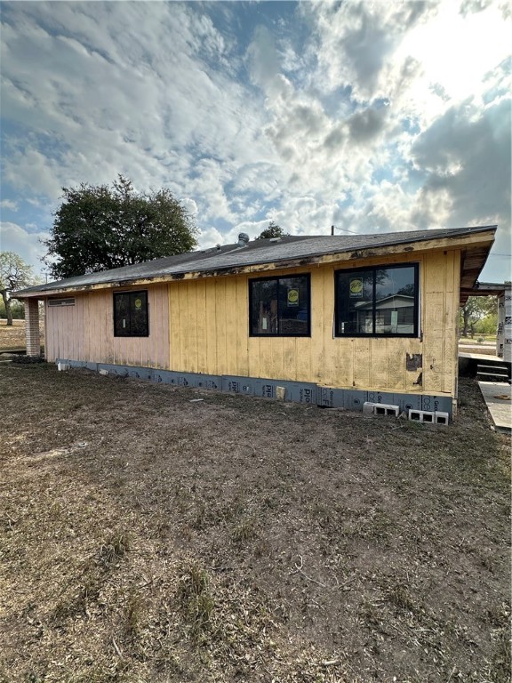 127 Lake Street Mathis, TX 78368 - Photo 8 of 33 a front view of house with yard