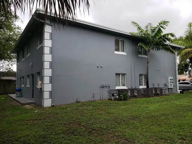 a view of a back yard of the house