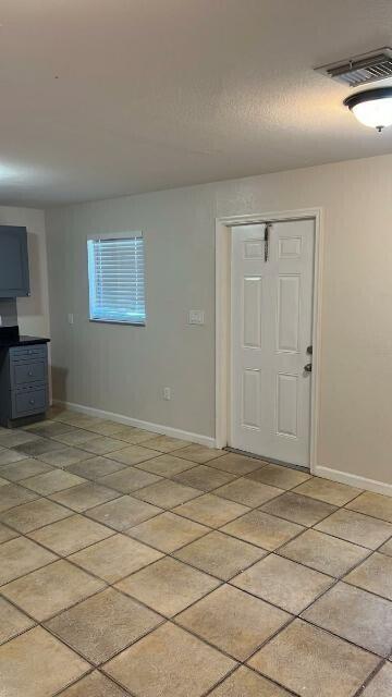 14040 Northeast 2nd Avenue Miami, FL 33161 - Photo 8 of 16 a view of empty room