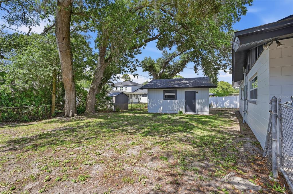 1946 Strathaven Road Winter Park, FL 32792 - Photo 36 of 37 a front view of a house with a garden
