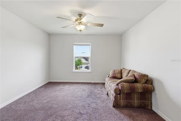 a workspace with furniture and window