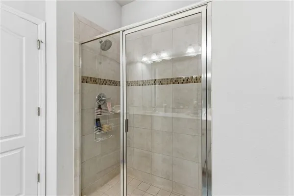 a view of hallway with shower