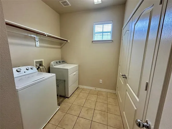 a view of utility room with washer and dryer
