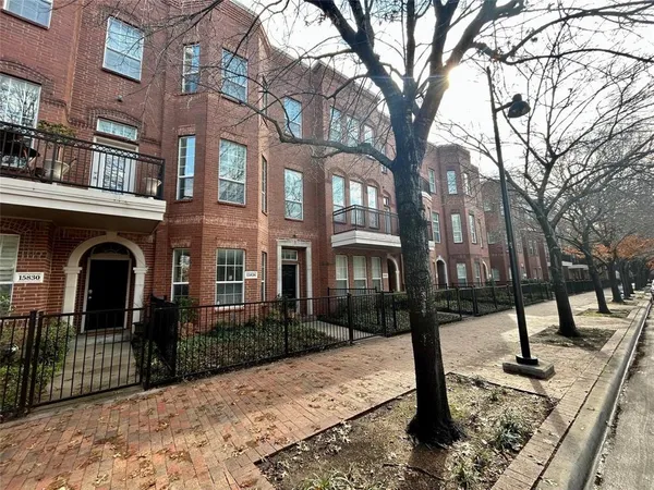 a front view of a building with street