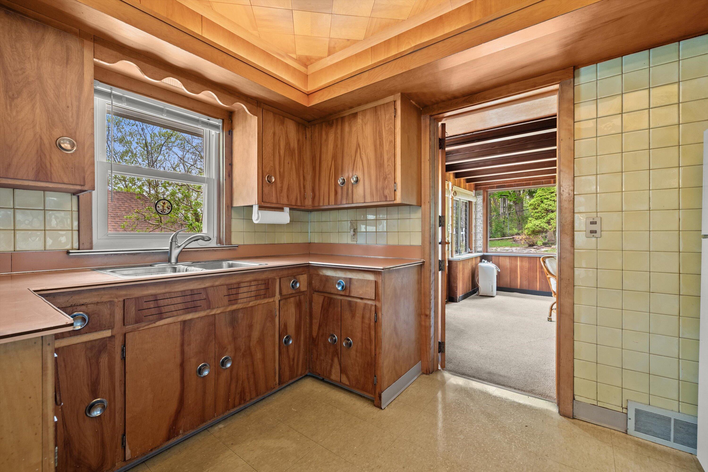 408 Valley Road Twin Lakes, WI 53181 - Photo 25 of 48 Original wood cabinets and tray ceiling make this kitchen Retro Chic!!