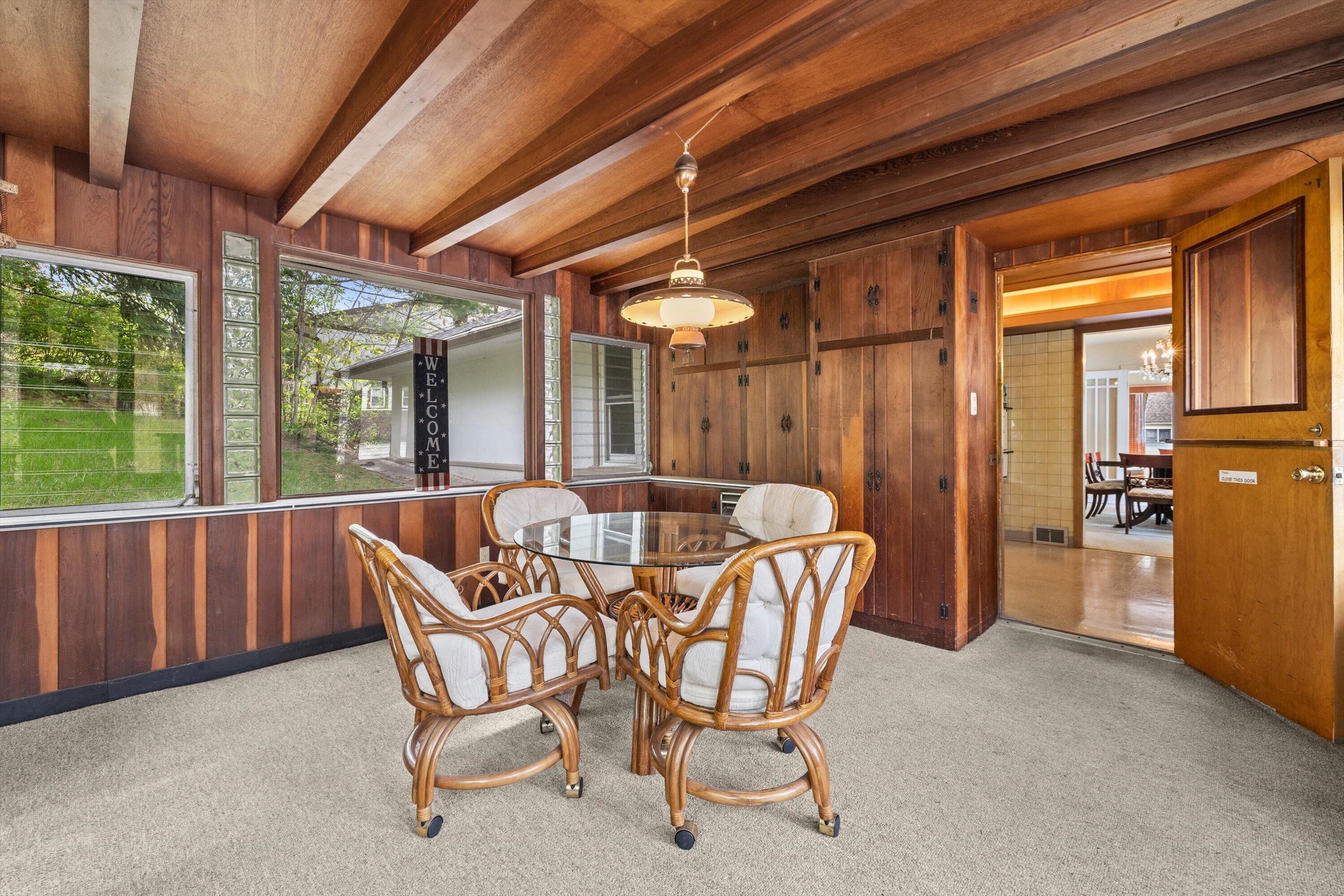 408 Valley Road Twin Lakes, WI 53181 - Photo 7 of 48 Back porch with tons of storage space. Huge windows provide lots of light anytime of day!!