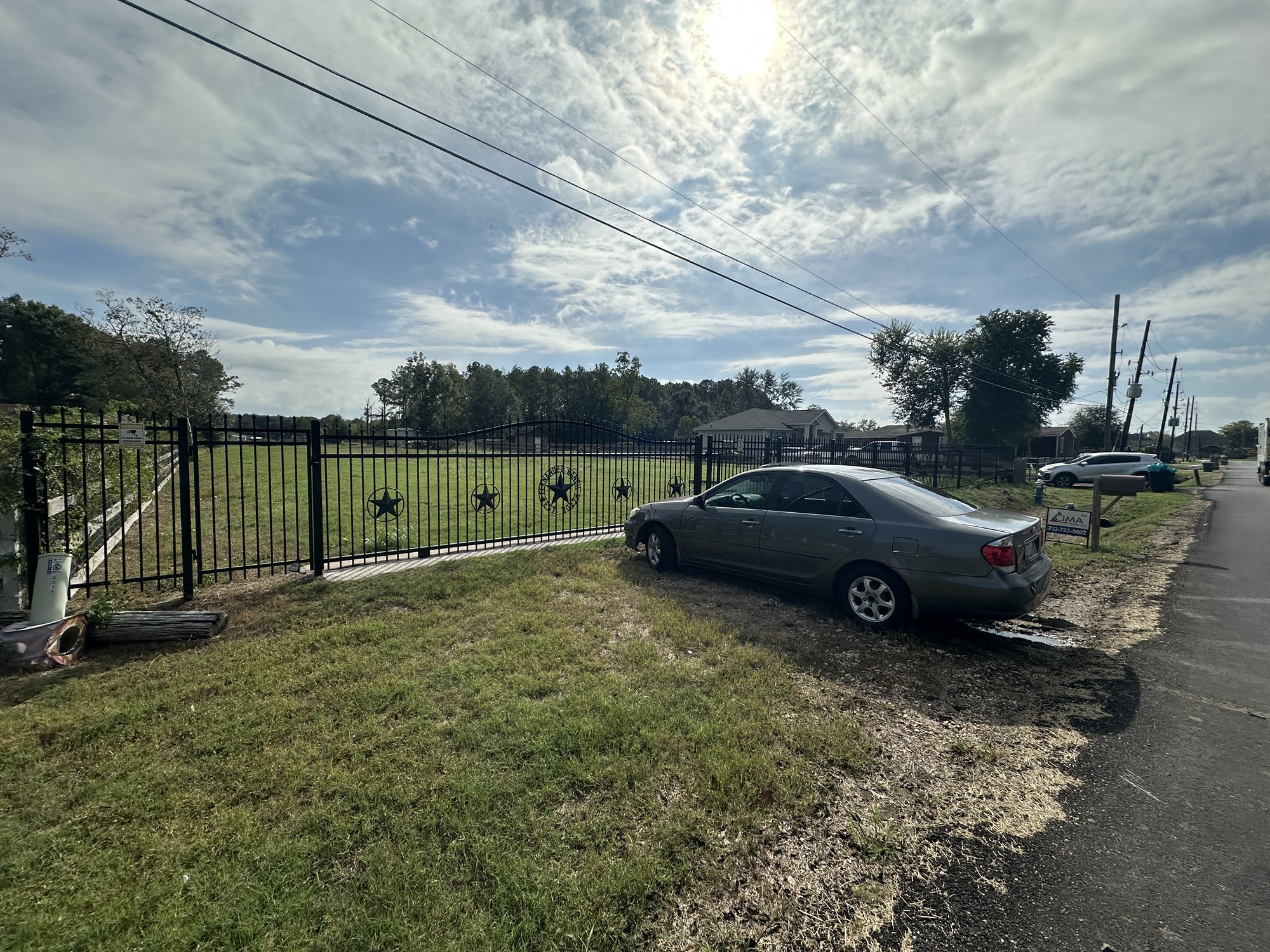 3315 Indiana Street Fresno, TX 77545 - Photo 5 of 6 a view of a yard with car parked