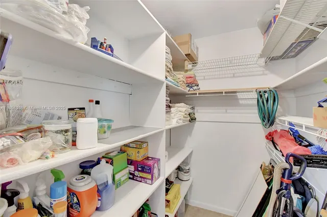 a storage & utility room with furniture and toys