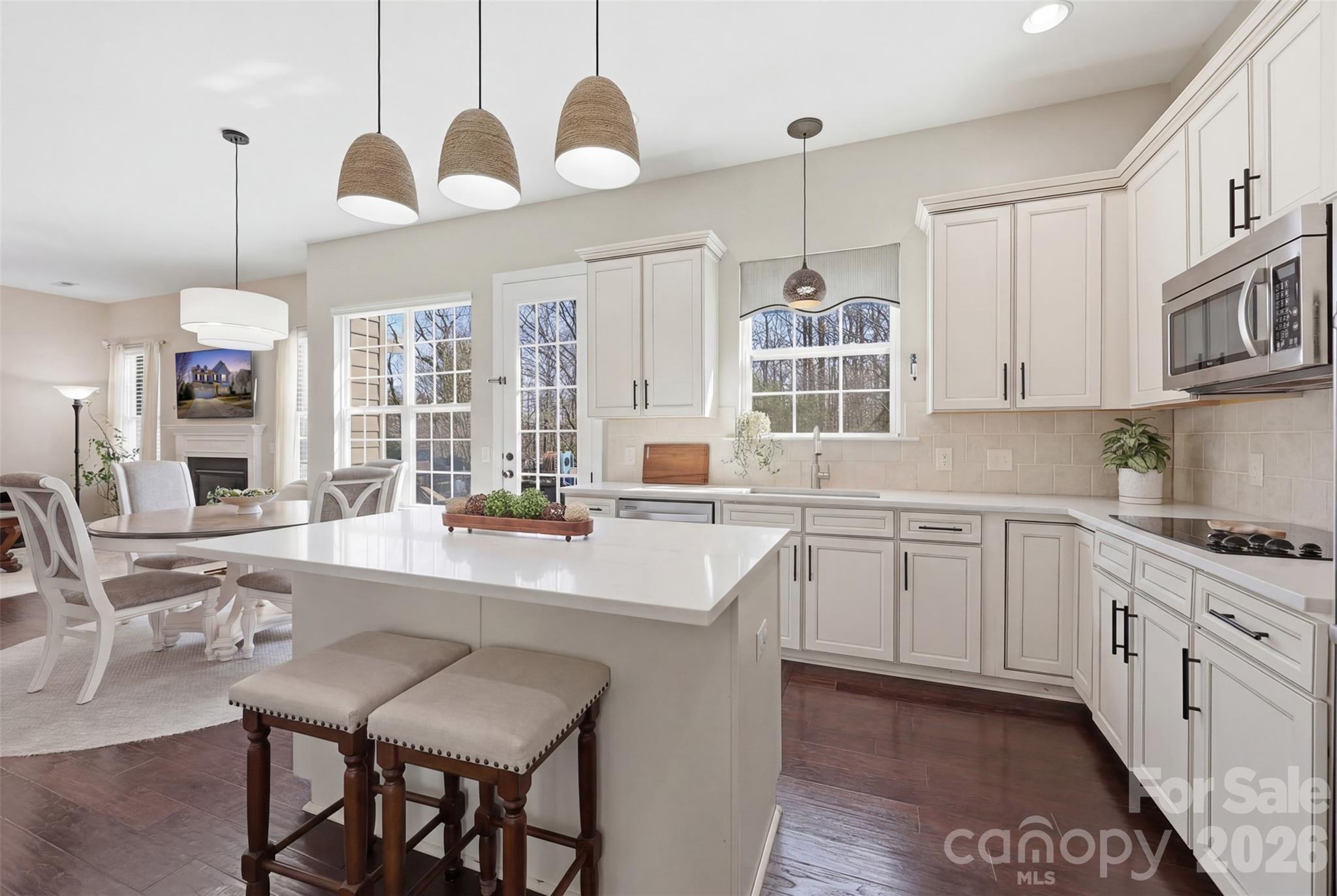 1210 Gold Rush Court Fort Mill, SC 29708 - Photo 11 of 39 a kitchen with a sink stove and cabinets