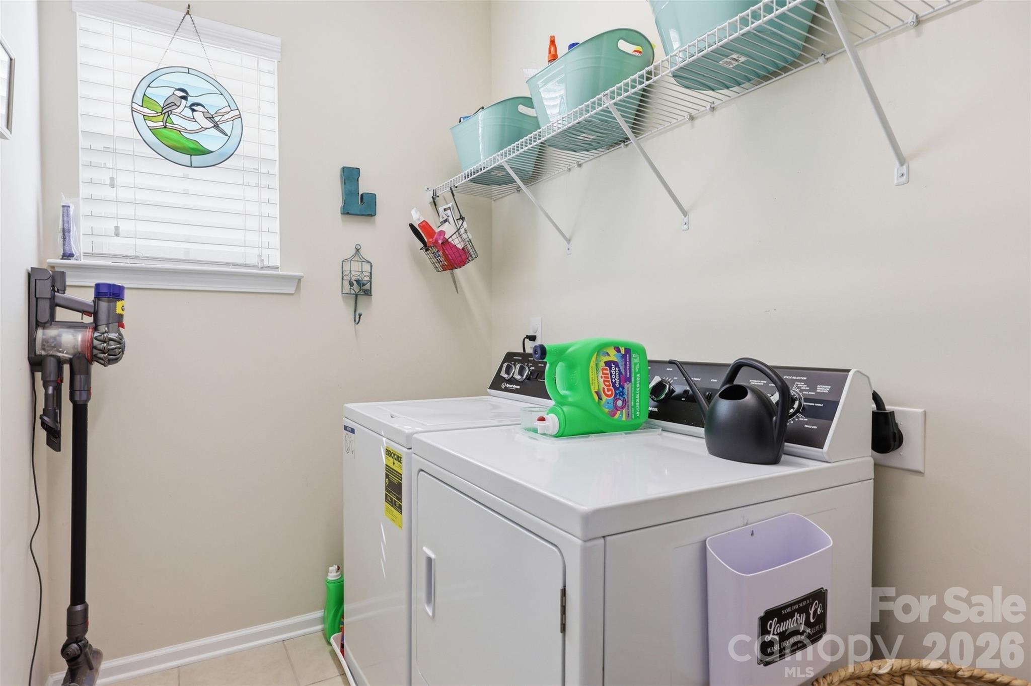 1210 Gold Rush Court Fort Mill, SC 29708 - Photo 23 of 39 a kitchen with a refrigerator a stove and a wooden floor