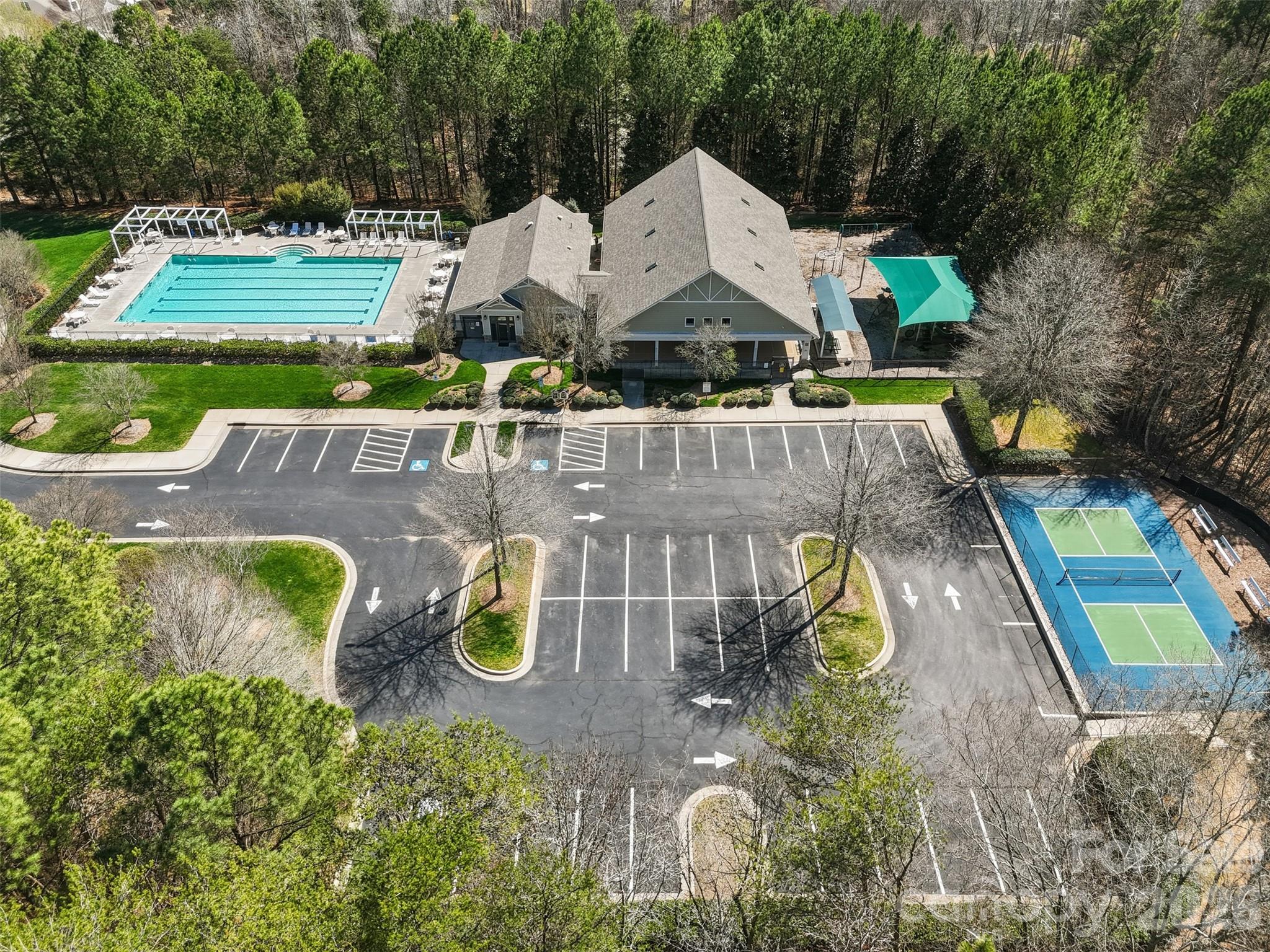 1210 Gold Rush Court Fort Mill, SC 29708 - Photo 34 of 39 an aerial view of a house with garden space and sitting space