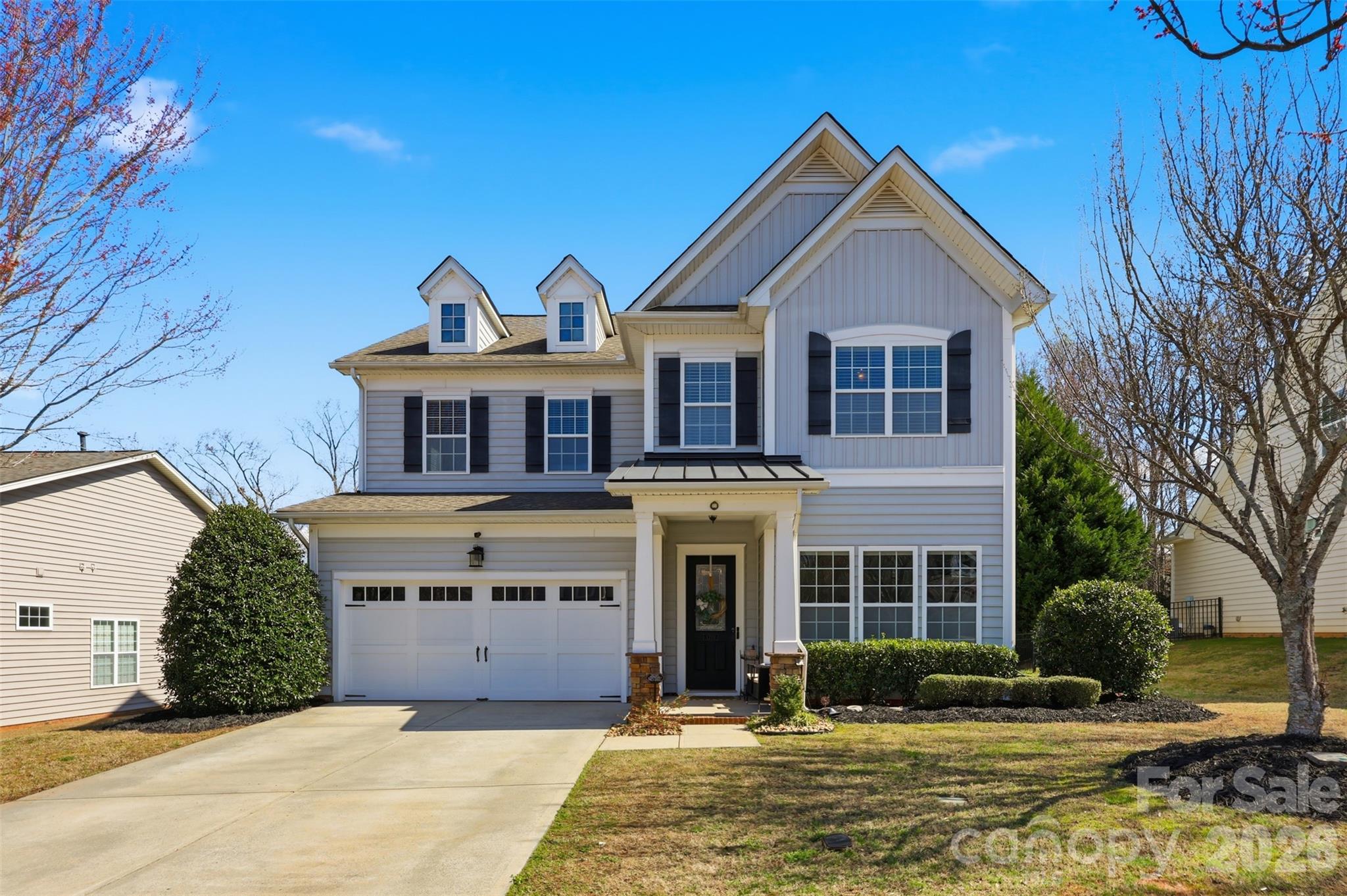 1210 Gold Rush Court Fort Mill, SC 29708 - Photo 5 of 39 a front view of a house with a yard