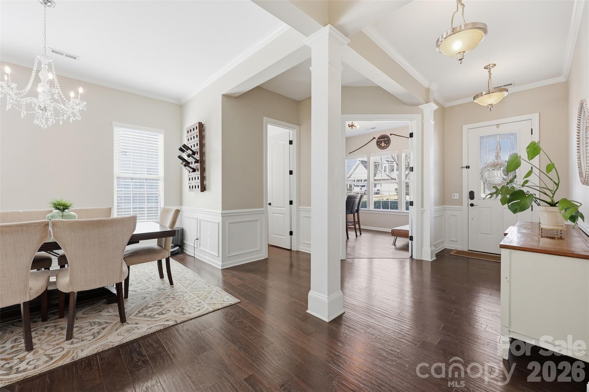 1210 Gold Rush Court Fort Mill, SC 29708 - Photo 7 of 39 a living room with furniture wooden floor and a chandelier