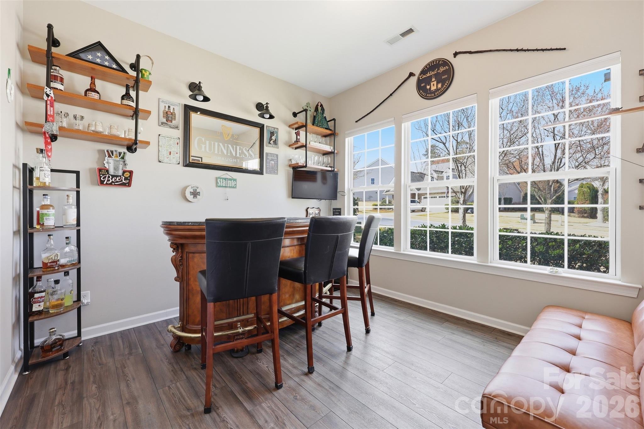 1210 Gold Rush Court Fort Mill, SC 29708 - Photo 8 of 39 a dining room with furniture and window