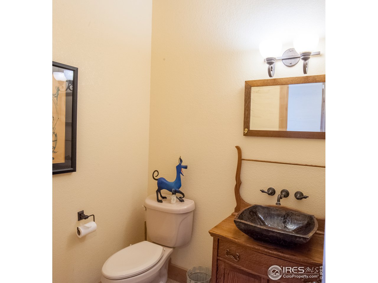 4900 Ridge Road Boulder, CO 80302 - Photo 30 of 38 a bathroom with a toilet and a sink