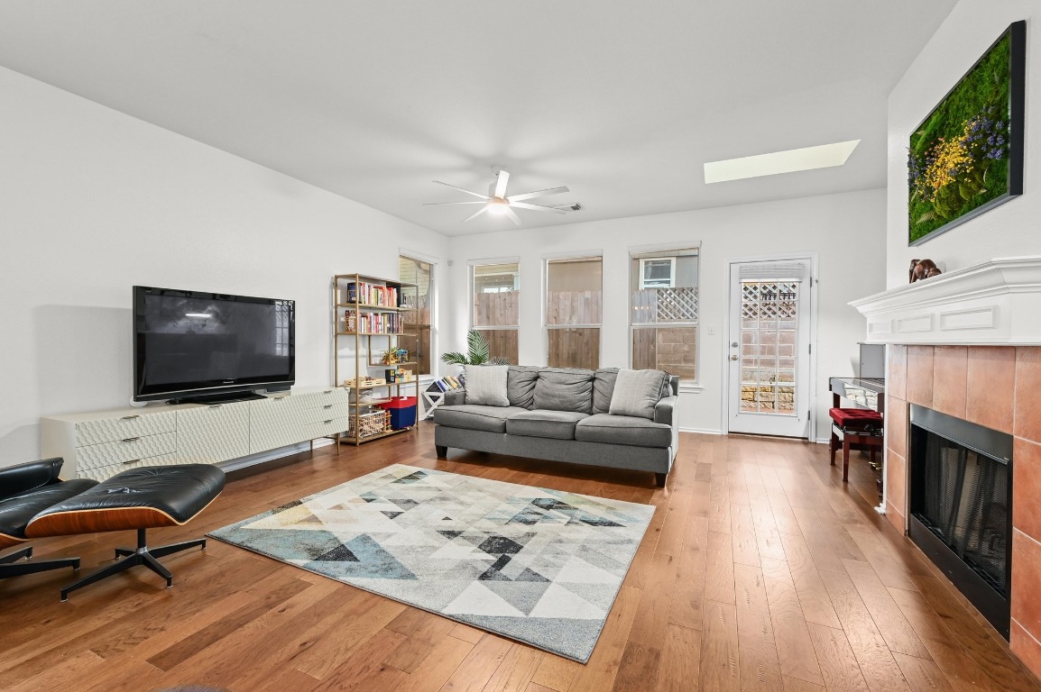 2721 Kinney Oaks Court Austin, TX 78704 - Photo 12 of 28 a living room with furniture and a flat screen tv
