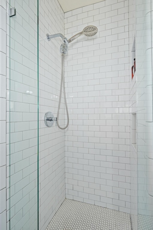 2721 Kinney Oaks Court Austin, TX 78704 - Photo 18 of 28 a bathroom with a shower