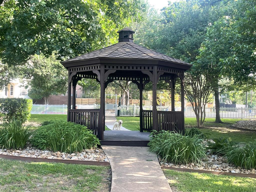 2721 Kinney Oaks Court Austin, TX 78704 - Photo 28 of 28 a front view of a house with garden