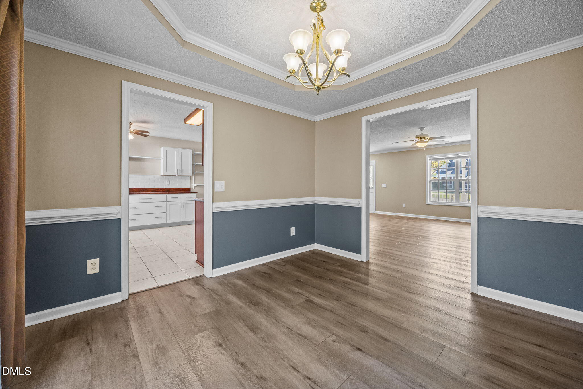 86 Pender Road Spring Lake, NC 28390 - Photo 11 of 35 wooden floor in an empty room with a window