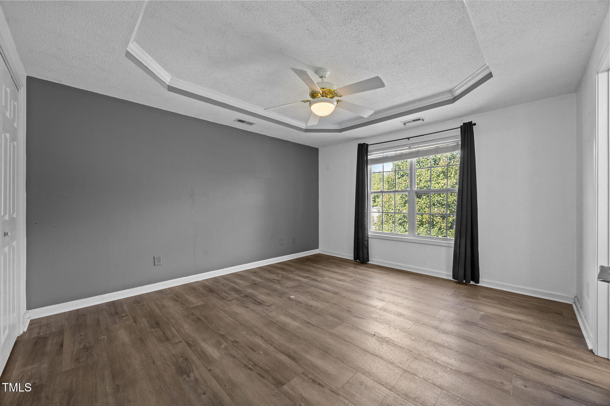 86 Pender Road Spring Lake, NC 28390 - Photo 17 of 35 a view of an empty room with a window