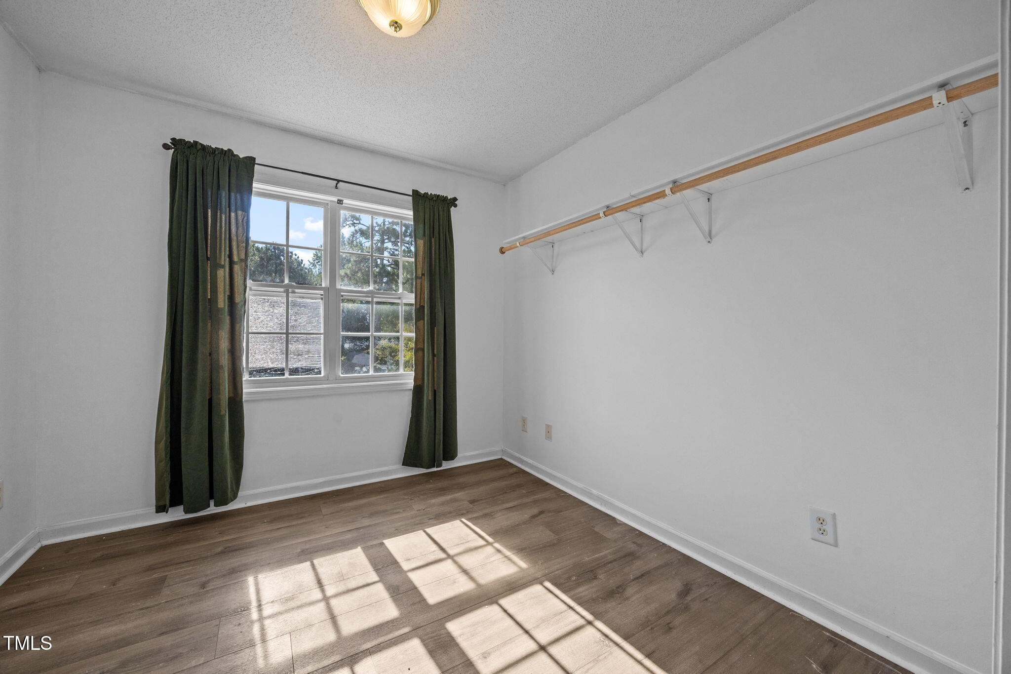 86 Pender Road Spring Lake, NC 28390 - Photo 25 of 35 a view of an empty room and window