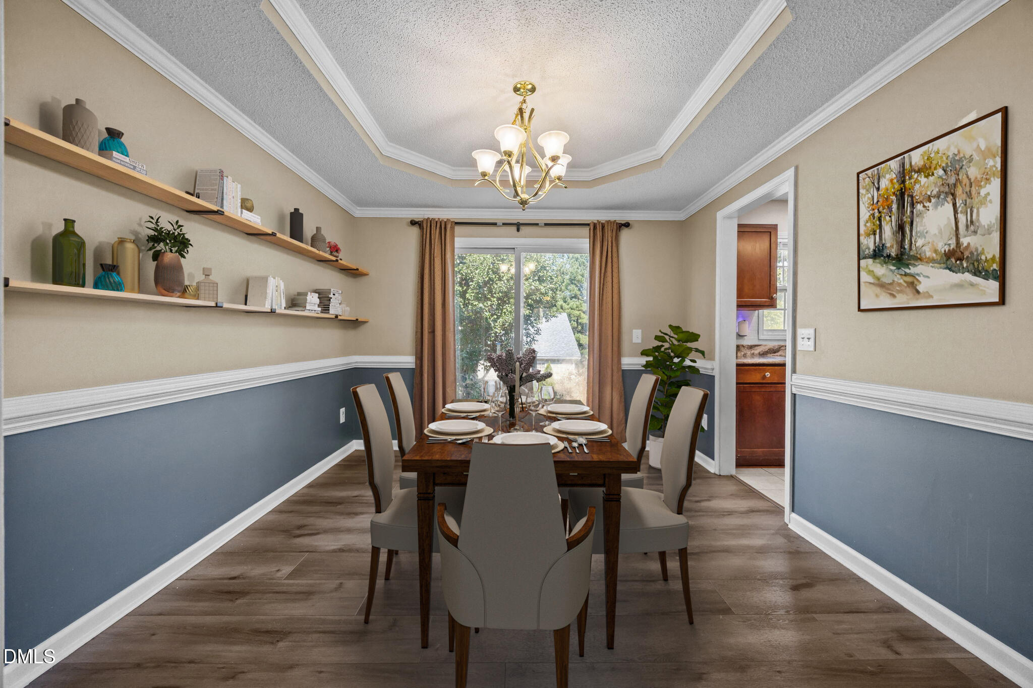 86 Pender Road Spring Lake, NC 28390 - Photo 9 of 35 a view of a dining room with furniture a chandelier and wooden floor