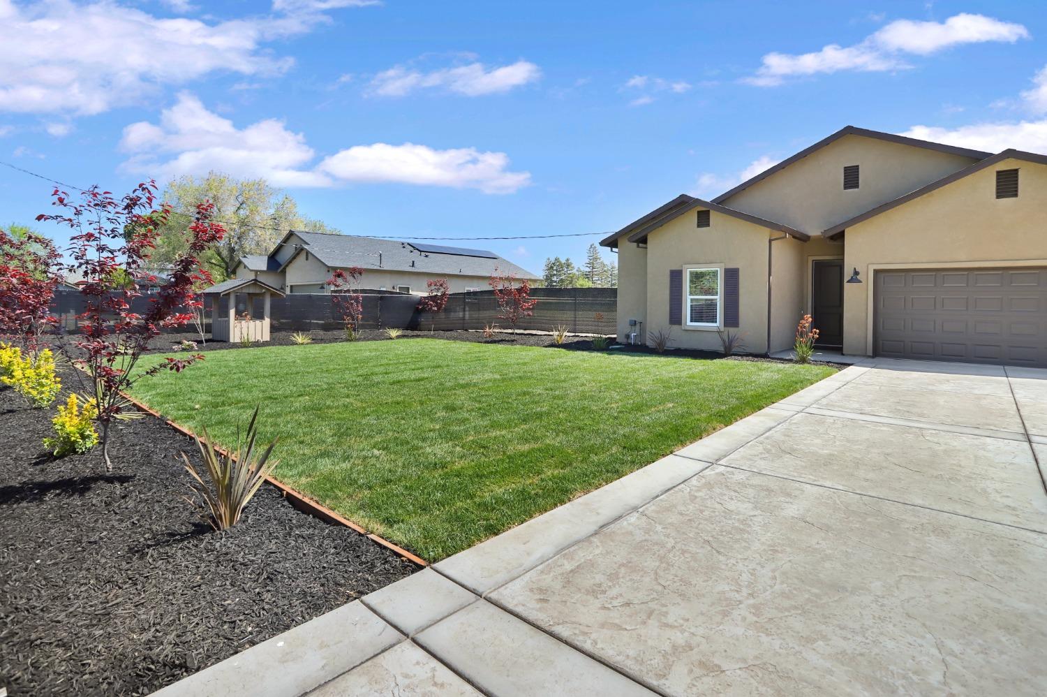 5774 Cherokee Road Stockton, CA 95215 - Photo 1 of 1 a view of a back yard of the house