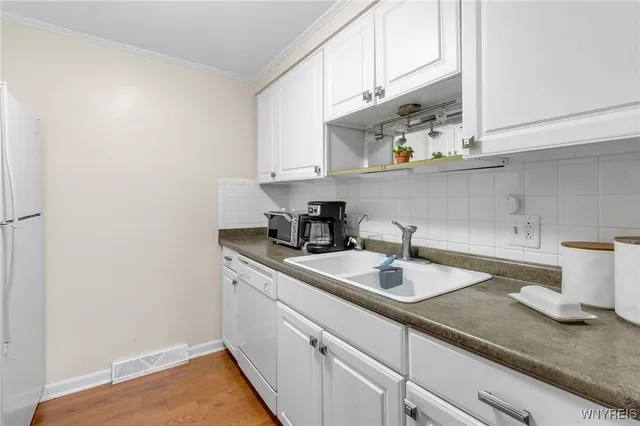 $144,900 | 70 Charter Oaks Drive, Unit 2, Amherst, NY 14228