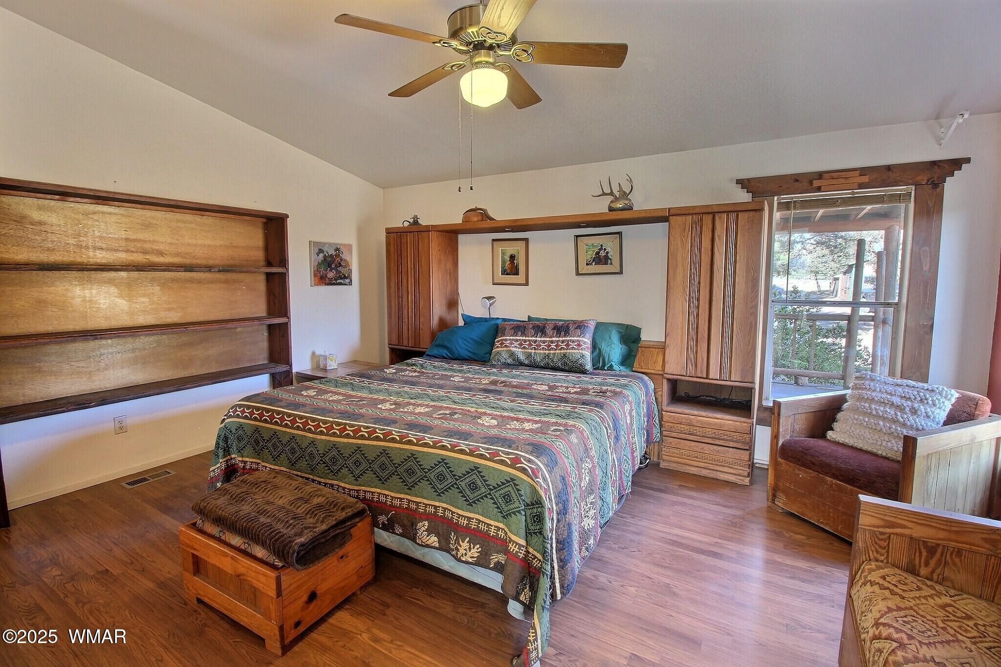 4134 Porter Mountain Road Lakeside, AZ 85929 - Photo 11 of 43 The Primary bedroom offers large windows for natural lighting.